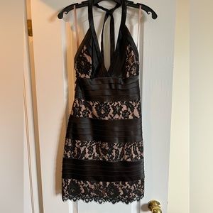 This is a black and nude BCBG dress size 04(s)